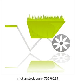 garden wheelbarrow with grass isolated on white