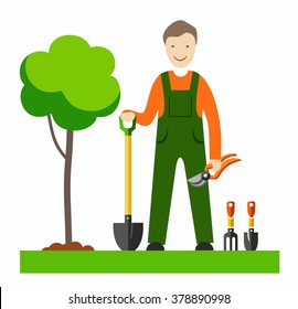 The gardener, with colour illustrations. A gardener with a shovel and garden tools on the lawn, next to a young tree. Vector picture. Color flat illustration on white background.  