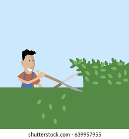 the gardener cuts trees with shears