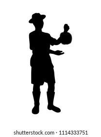 Gardener with durian in hand silhouette vector