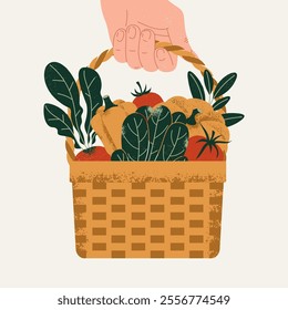 Gardener hand and basket. A person holding a basket of freshly harvested vegetables