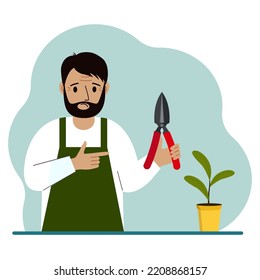 A gardener is a man in working clothes, he has a pruner in his hand. Vector flat illustration