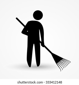 Gardener with a rake