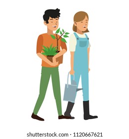 Gardeners with plants and tools