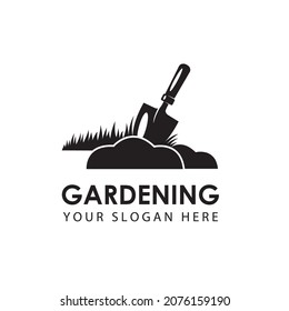 gardening emblem with trowel spade and ground isolated on white background