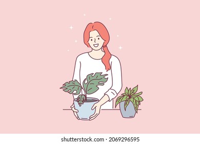 Gardening and house plants concept. Young smiling girl cartoon character standing holding green plants blooming in pots vector illustration 