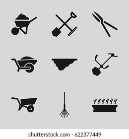 Gardening icons set. set of 9 gardening filled icons such as shovel and rake, wheel barrow, construction, rake, garden tools, gardening tool, wheelbarrow, plant in pot