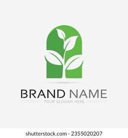 Gardening logo with shovel icon and tree with green leaves logo template.