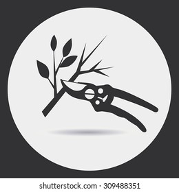 Gardening. Pruning secateurs dry branches. A black silhouette on a light background in a round frame.