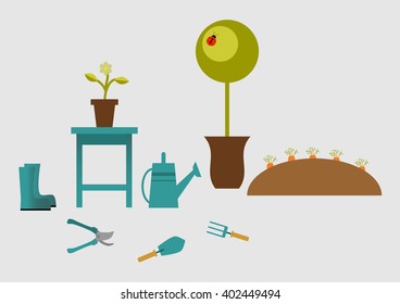 Gardening tools on a gray background
