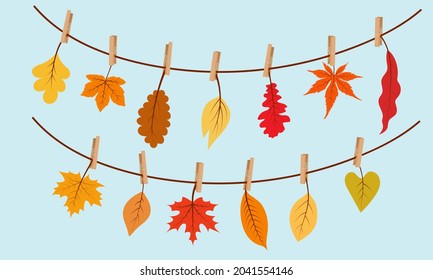 Garland of autumn leaves, leaves on clothespins. Concept for seasonal banner, poster, card.