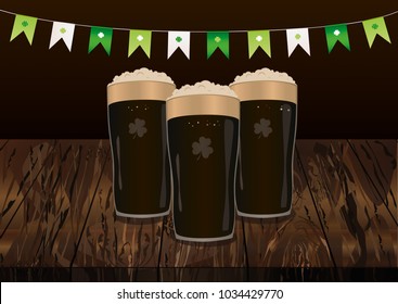 Garland of flags with clover. A glass of dark beer. Invitation to the St. Patrick's Day. Greeting card. Free space for your ad or text. Vector illustration on wooden background.