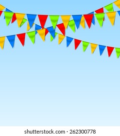 Garland flags on string with blue sky in the background