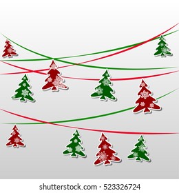garland of green and red firs decorated with snowflakes