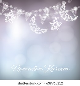 Garlands with decorative moons, stars, lights and party flags. Vector illustration card, invitation for Muslim community holy month Ramadan Kareem. Blue festive blurred background.