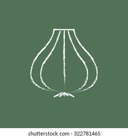 Garlic hand drawn in chalk on a blackboard vector white icon isolated on a green background.