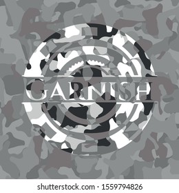 Garnish on grey camouflaged texture