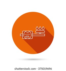 Gas counter icon. Pipe with fire sign. Round orange web button with shadow.