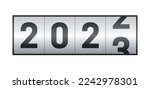Gas pump analog gauge counter with the numbers 2022 changing to 2023 symbolizing the end of the year and beginning of another year. New year, reveillon, two thousand and twenty-three, happy new year.
