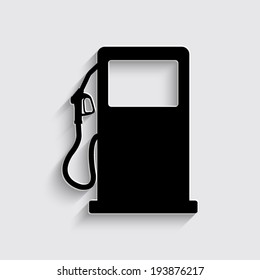 gas station sign with shadow on a grey background