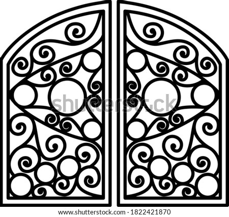 Gate with a picture. The gate has curls and curves.