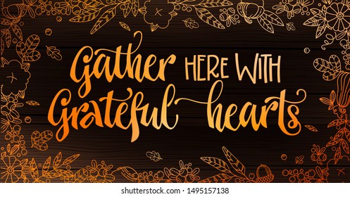 Gather here with Grateful Hearts - quote. Thanksgiving dinner theme hand drawn lettering phrase. Logo, text design. Pumpkin, leaves, cotton design.  Orange text on dark wood background. 