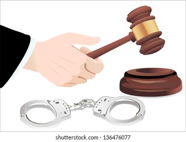 Gavel in hand and handcuffs isolated on white