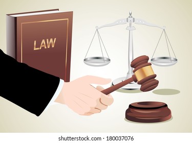 Gavel in hand, scales of justice and law book