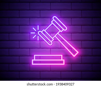 Gavel, law neon icon. Elements of Law and Justice set. Simple icon for websites, web design, mobile app, info graphics isolated on brick wall.