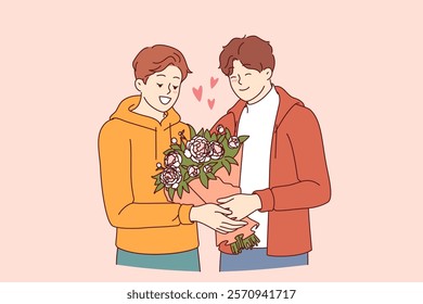 Gay man gives flowers to boyfriend during date and feels safe thanks to society tolerance for LGBT people. Gay guy receives bouquet from lover, on anniversary of relationship or on valentine day