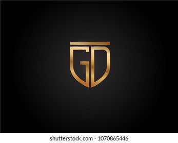 GD shield shape Letter Design in gold color