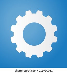Gear or cog vector illustration on a blue background.