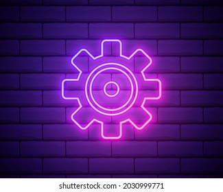 Gear, maintenance. Pink neon vector icon. Glowing gear symbol isolated on brick wall background.