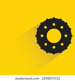 gear with shadow on yellow background
