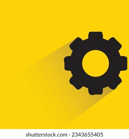gear with shadow on yellow background