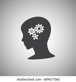Gear symbol in the head of a thinking silhouette woman on a background