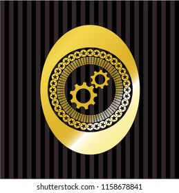 gear, team work icon inside gold emblem