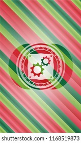 gear, team work icon inside christmas colors emblem.