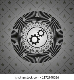 gear, team work icon inside dark badge or emblem