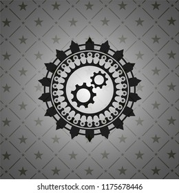gear, team work icon inside realistic dark emblem
