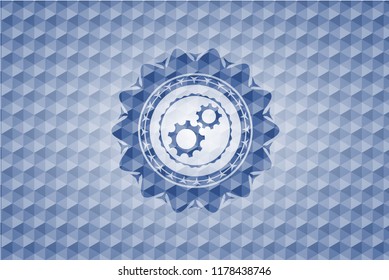 gear, team work icon inside blue hexagon badge.