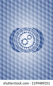 gear, team work icon inside blue hexagon emblem.
