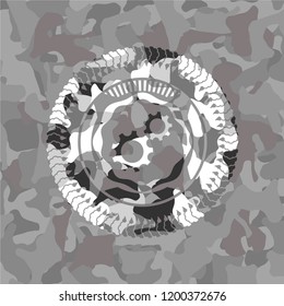 gear, team work icon inside grey camouflage texture