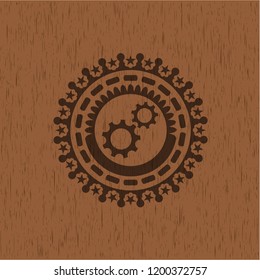 gear, team work icon inside retro style wooden emblem