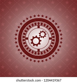 gear, team work icon inside red icon or emblem