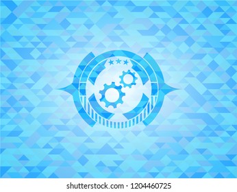 gear, team work icon inside sky blue emblem. Mosaic background