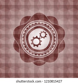 gear, team work icon inside red seamless emblem or badge with abstract geometric pattern background.
