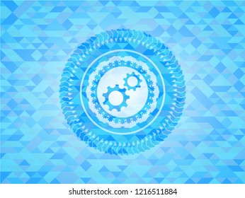 gear, team work icon inside sky blue emblem with mosaic ecological style background