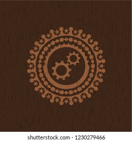 gear, team work icon inside retro style wooden emblem
