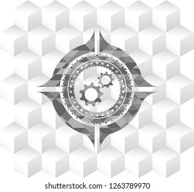 gear, team work icon inside realistic grey emblem with geometric cube white background